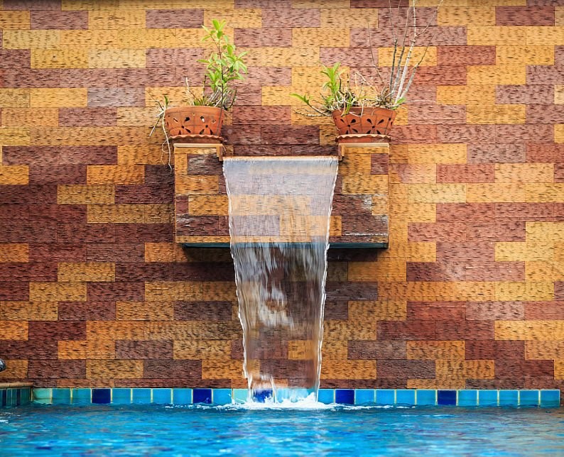 Small modern spa pool with water flow